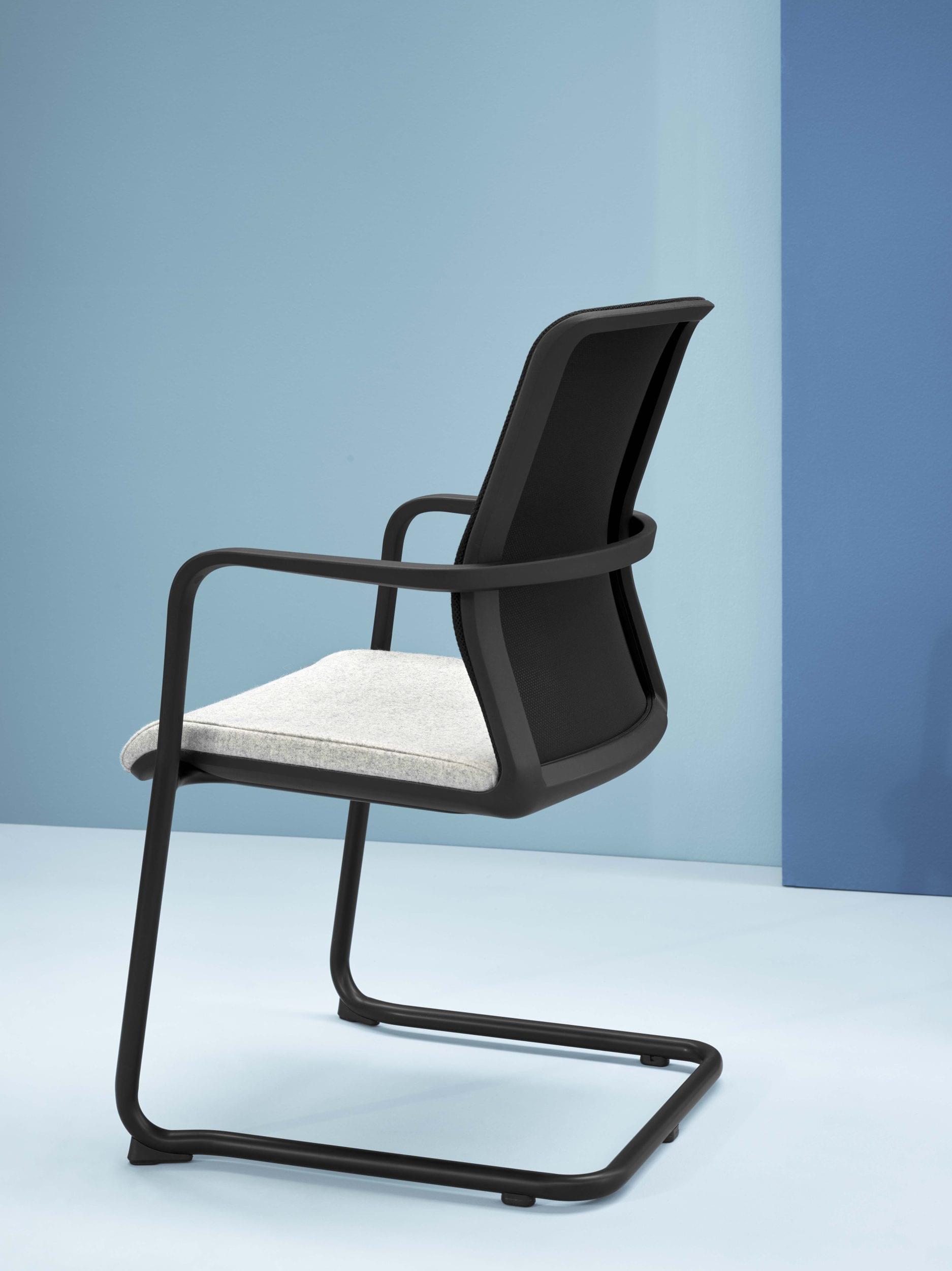Side view of Senator Circo meeting chair